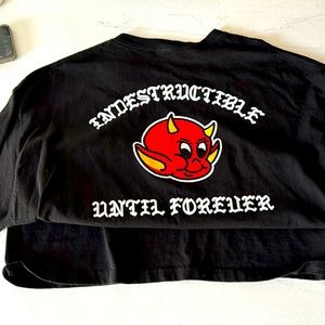 Indestructible brand shirt